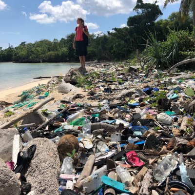 Beach littered with plastic waste 